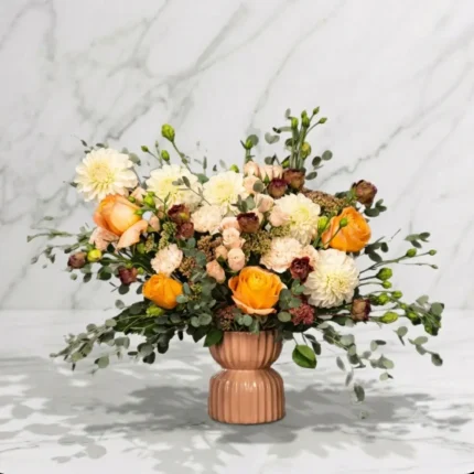 Golden Sunshine flower arrangement in ceramic vase for Downtown Vancouver delivery.